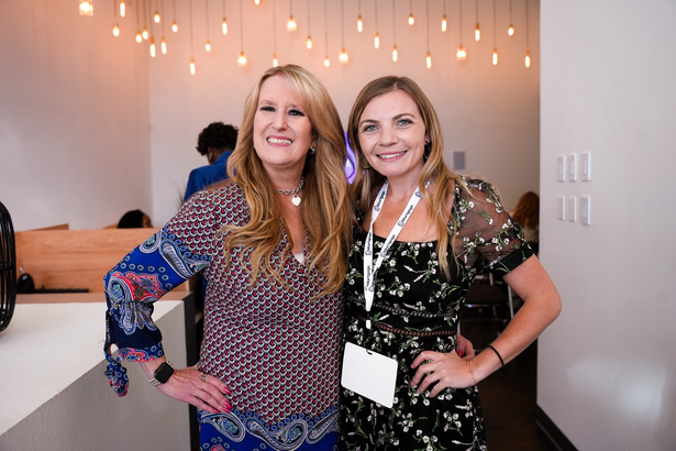 Corie Meredith with a colleague